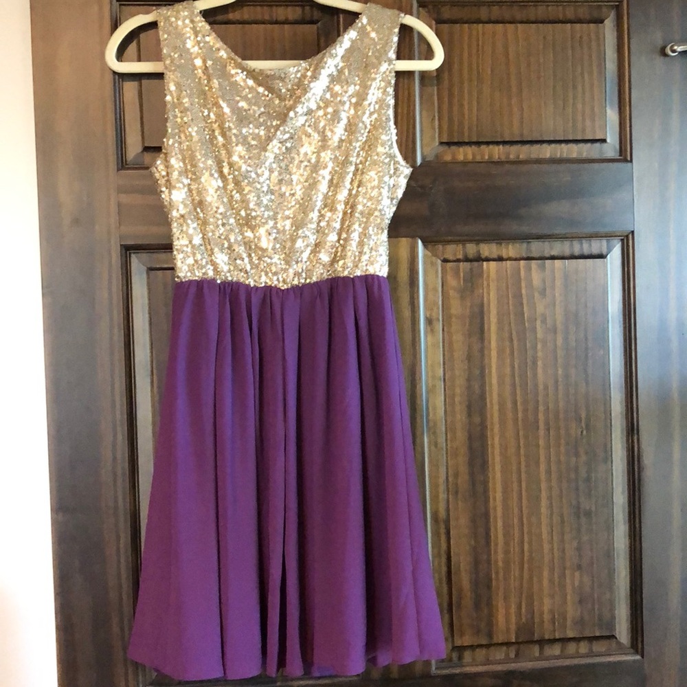 Beautiful gold sequence and purple dress!